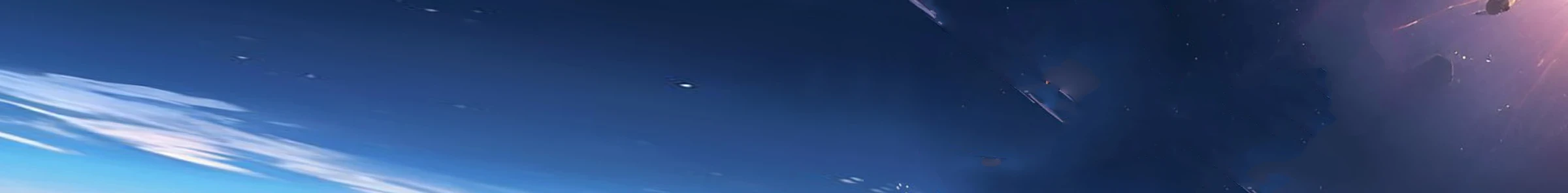 A space scene showing a vast expanse with scattered stars.